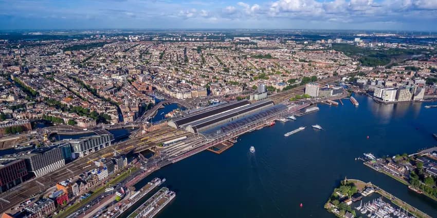 City aerial view over Amsterdam, The Netherlands. View from the bird's flight