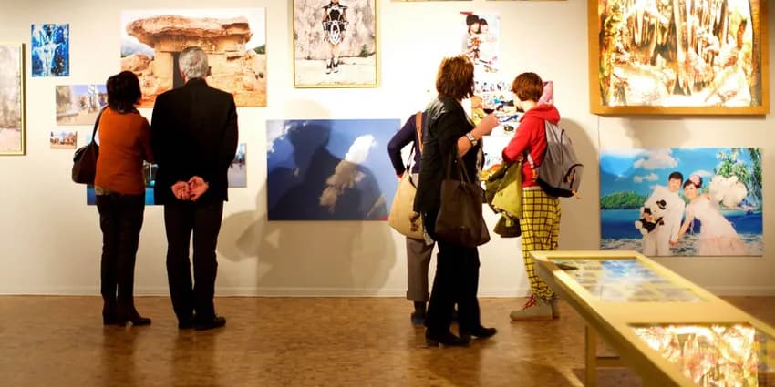 People looking at art