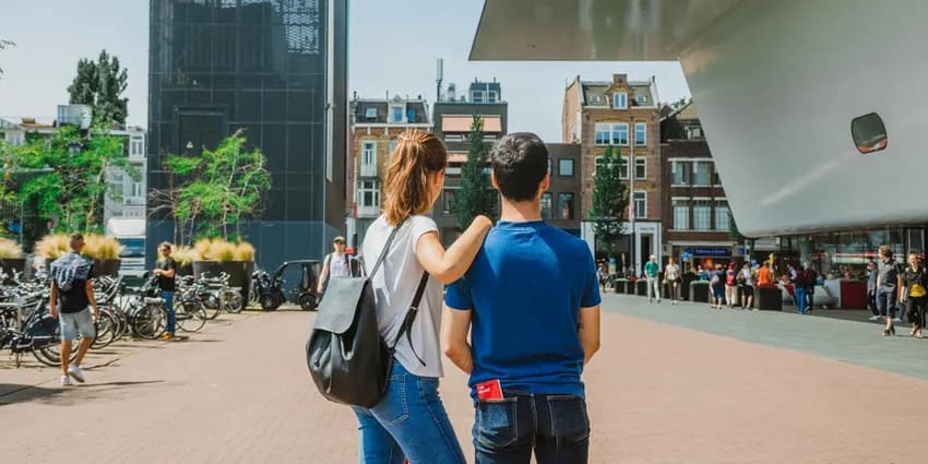 A couple at the Museumplein Stedelijk Museum