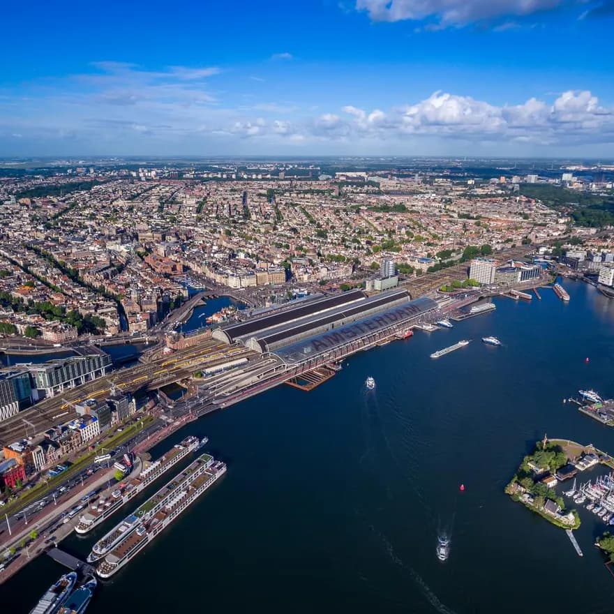 City aerial view over Amsterdam, The Netherlands. View from the bird's flight