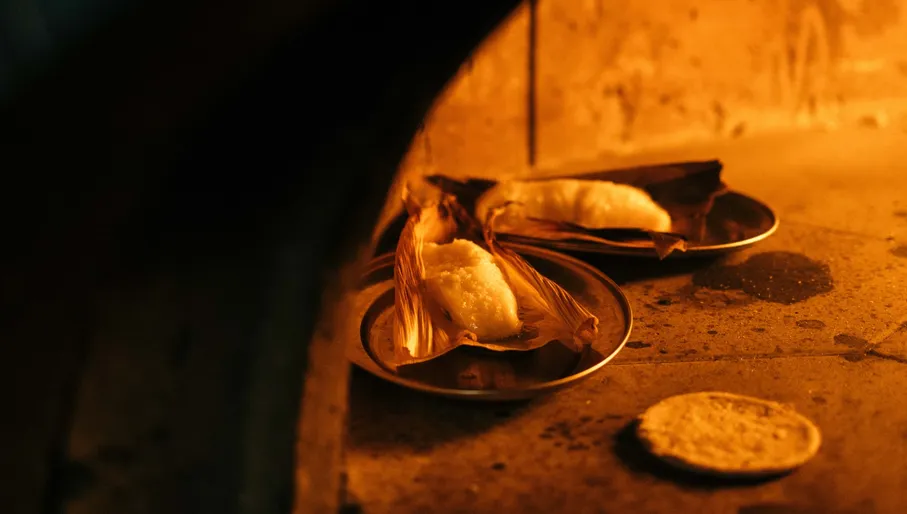 NELA signature dishes made on open fire