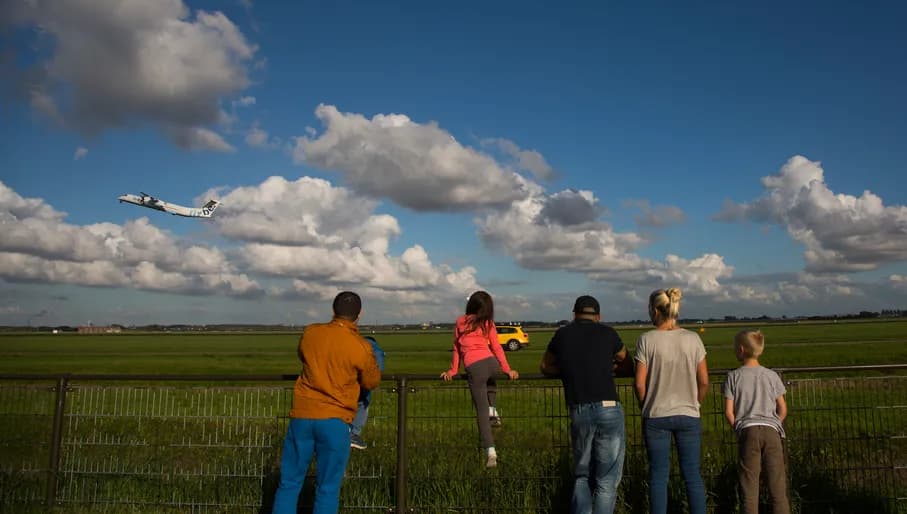 Five Airplane Watchers at the Polderbaan van Schiphol